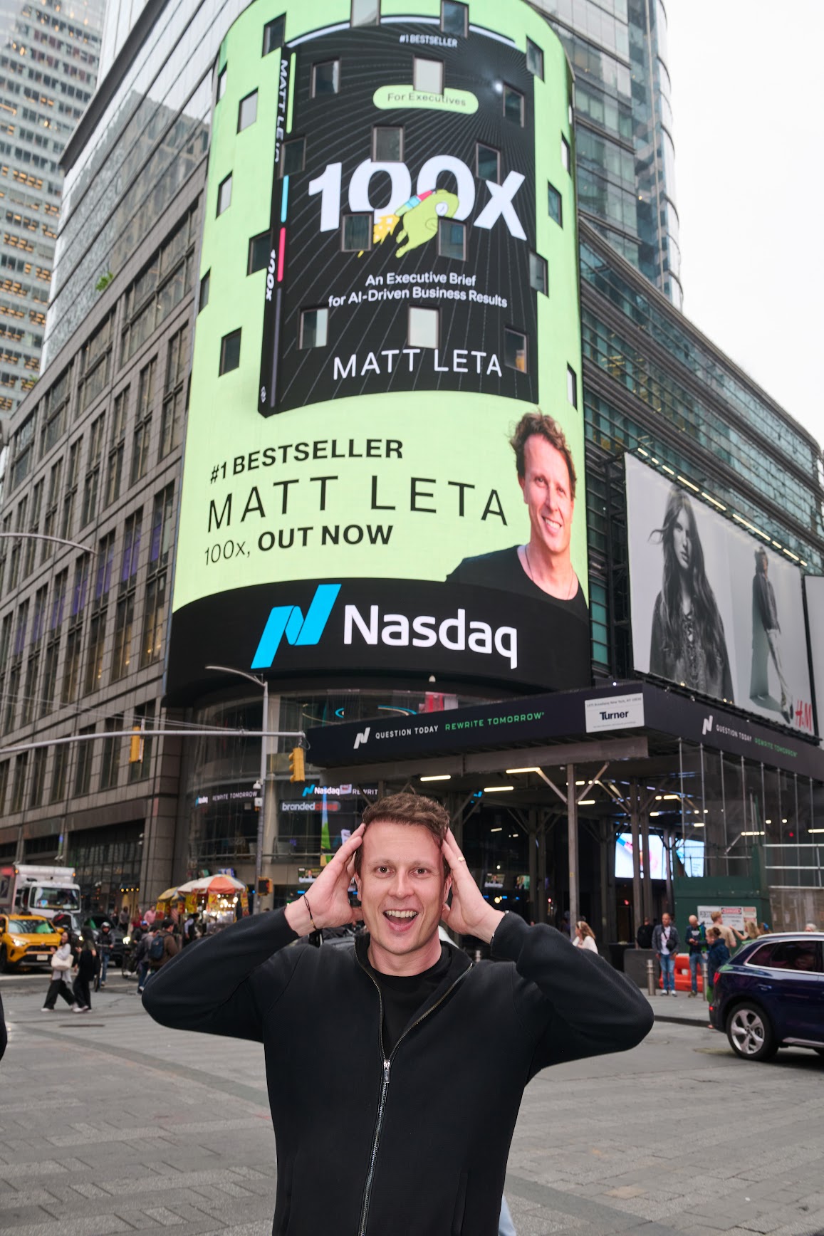 Matt Leta at Nasdaq Times Square billboard for 100x book launch